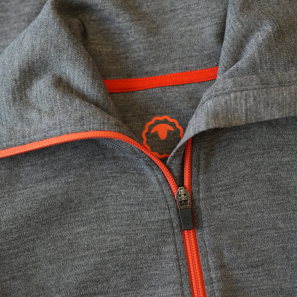 Isobaa | Mens 320 Merino Full Zip (Charcoal/Orange) | Step into a new level of comfort and versatility with our 320 Merino Full Zip Jacket