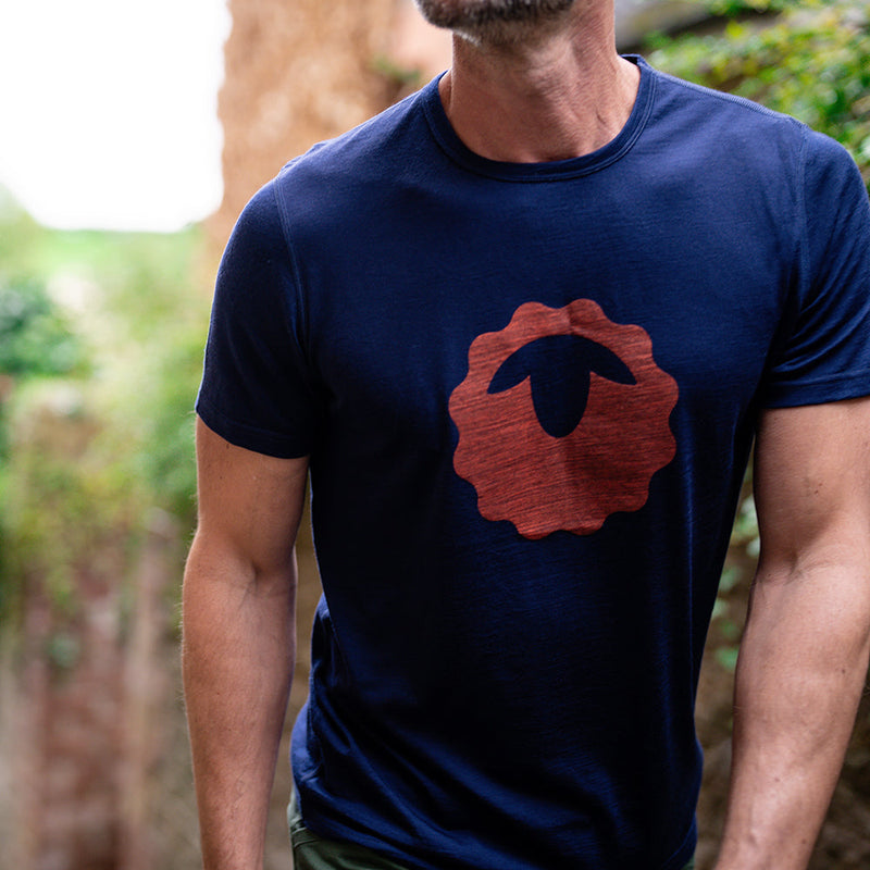 Isobaa | Mens Merino 150 Emblem Tee (Navy/Orange) | Conquer trails and city streets in comfort with Isobaa's superfine Merino T-Shirt.