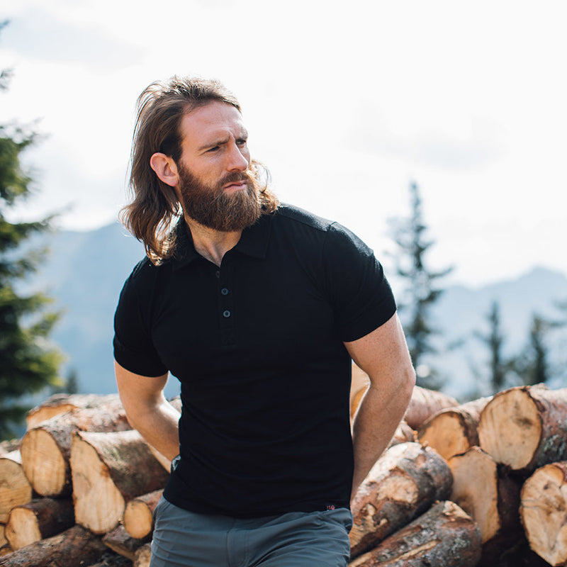 Isobaa |Mens Merino 180 Short Sleeve Polo Shirt (Plain Black) | The ultimate Merino wool polo – perfect for weekend hikes, bike commutes, post-adventure coffee stops, office days, and everything in-between.