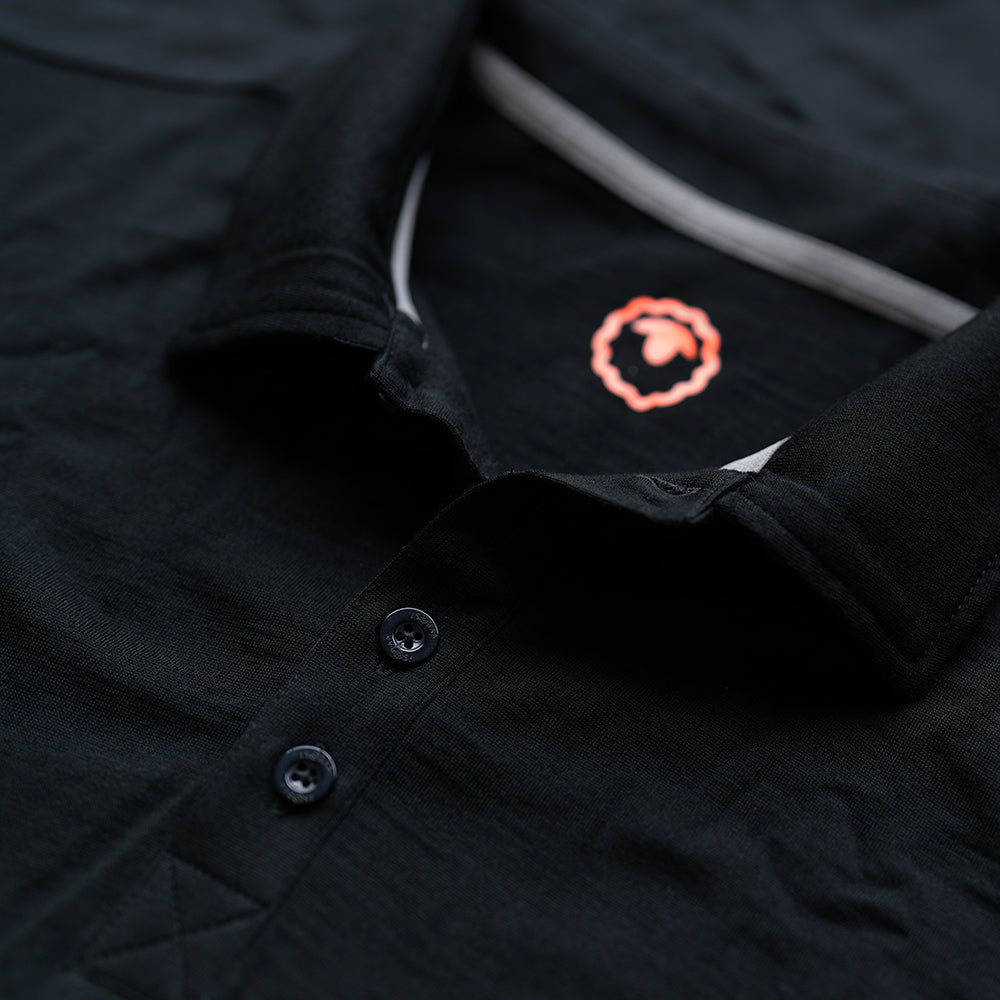 Isobaa |Mens Merino 180 Short Sleeve Polo Shirt (Plain Black) | The ultimate Merino wool polo – perfect for weekend hikes, bike commutes, post-adventure coffee stops, office days, and everything in-between.