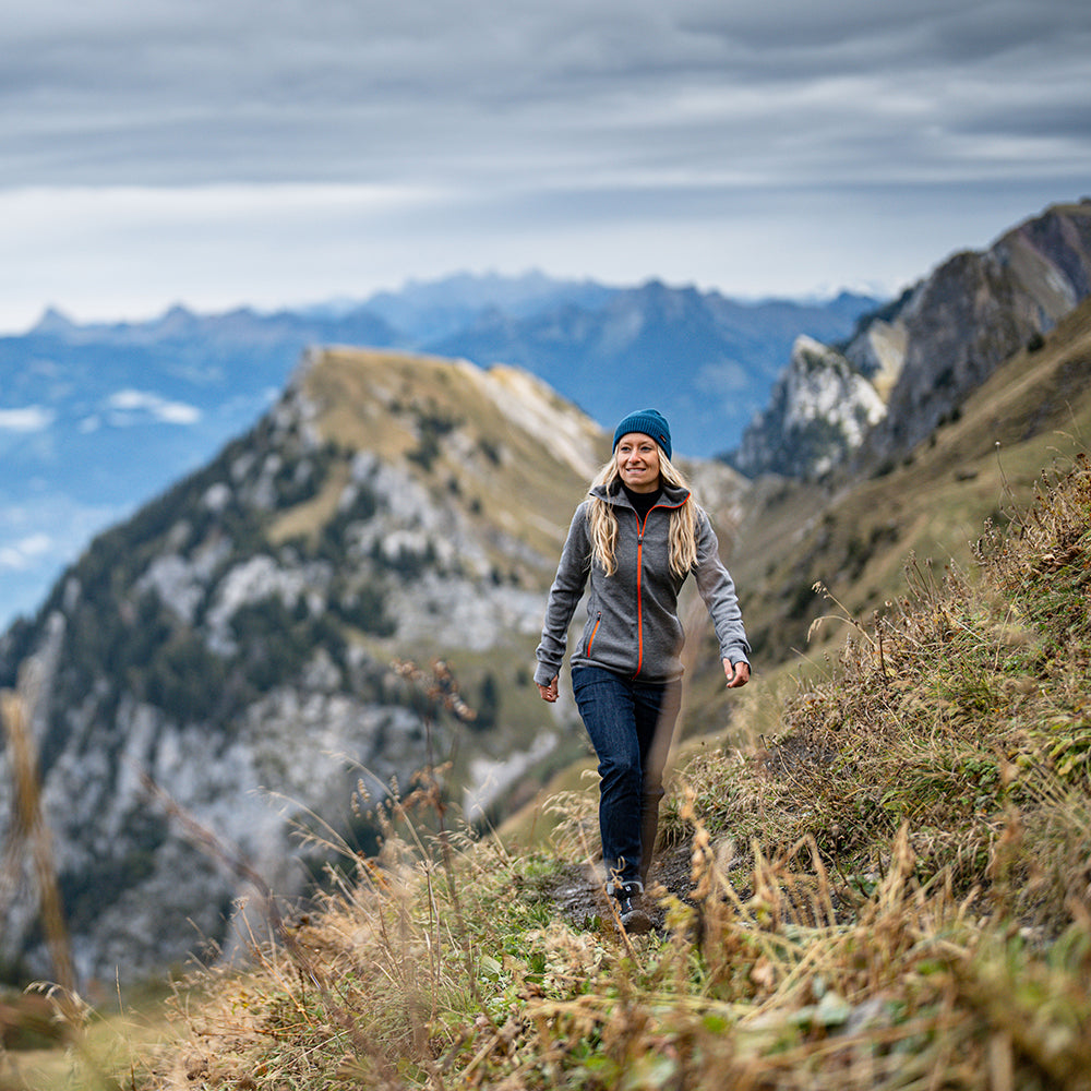 Isobaa | Womens 320 Merino Full Zip (Charcoal/Orange) | Step into a new level of comfort and versatility with our 320 Merino Full Zip Jacket