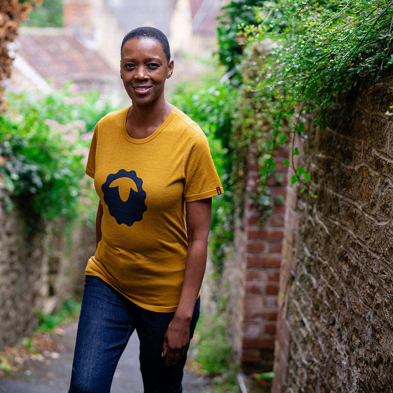 Isobaa | Womens Merino 150 Emblem Tee (Mustard/Navy) | Conquer trails and city streets in comfort with Isobaa's superfine Merino T-Shirt.