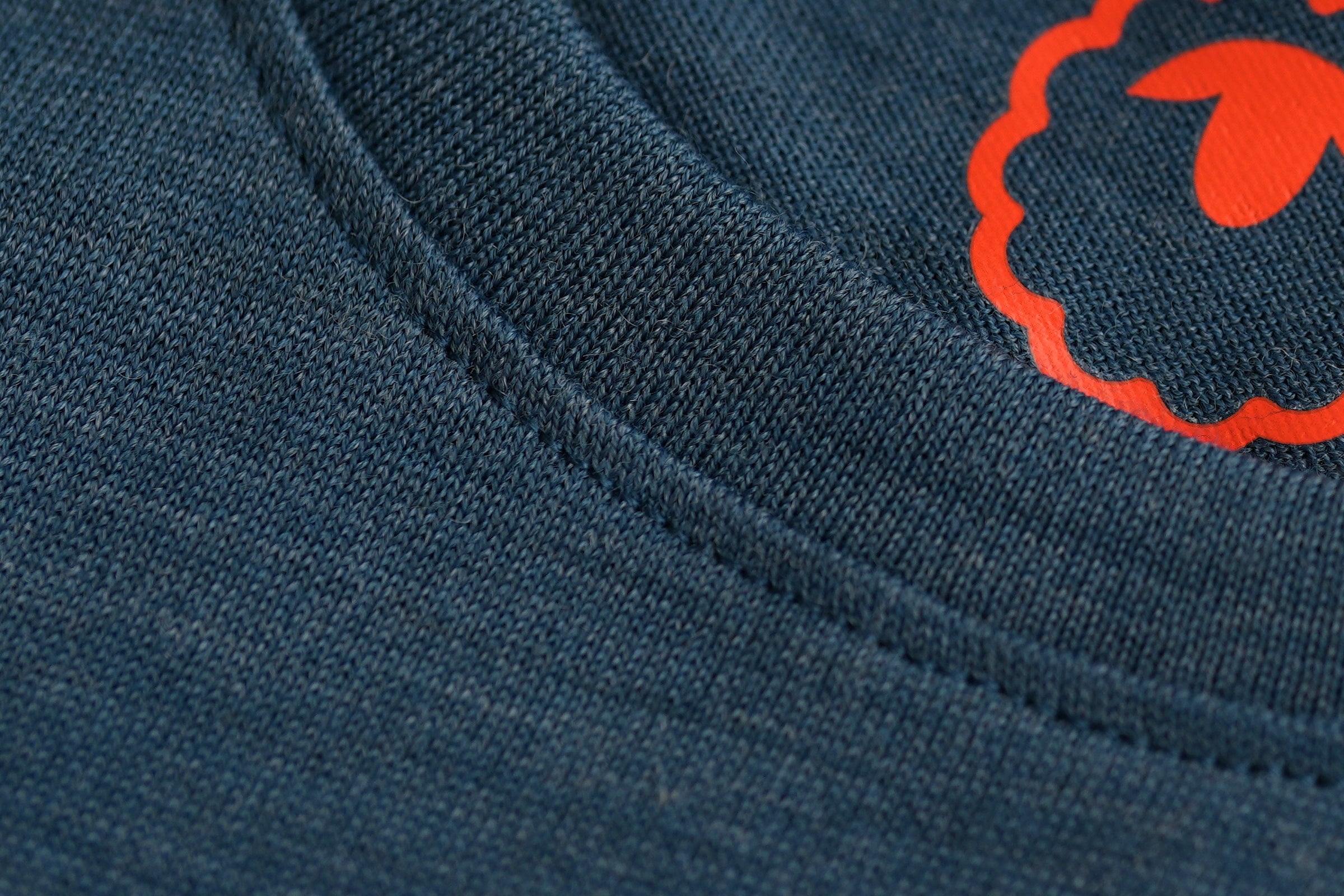 Detailed image of the fabric of an Isobaa merino wool top showcasing the fine knit texture