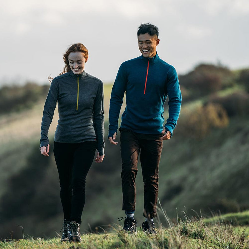 Isobaa | Mens Merino 320 Long Sleeve Half Zip (Petrol/Orange) | Conquer cold trails, blustery commutes, and unpredictable weather with the ultimate Merino wool half-zip top.