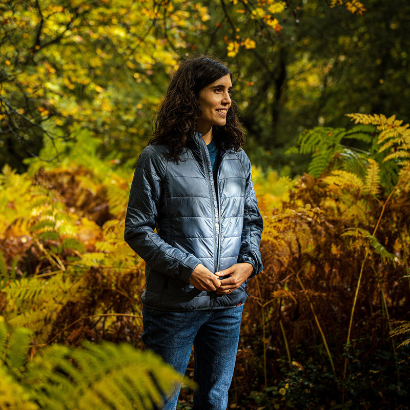 Isobaa | Womens Packable Insulated Jacket (Denim/Navy) | Exceptional warmth, packable convenience, and sustainable design with our lightweight Merino wool jacket.